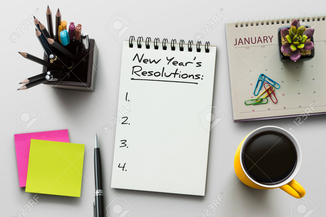 167376201-new-year-resolutions-goals-or-action-plan-concept-notebook-on-office-table-with-calendar-coffee