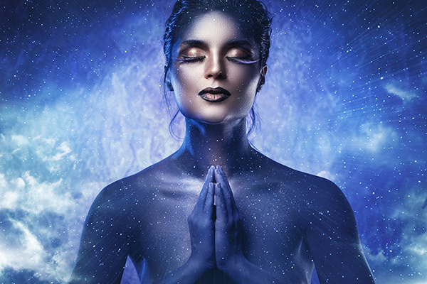 Spiritually aware woman listening to her intuitive inner guidance